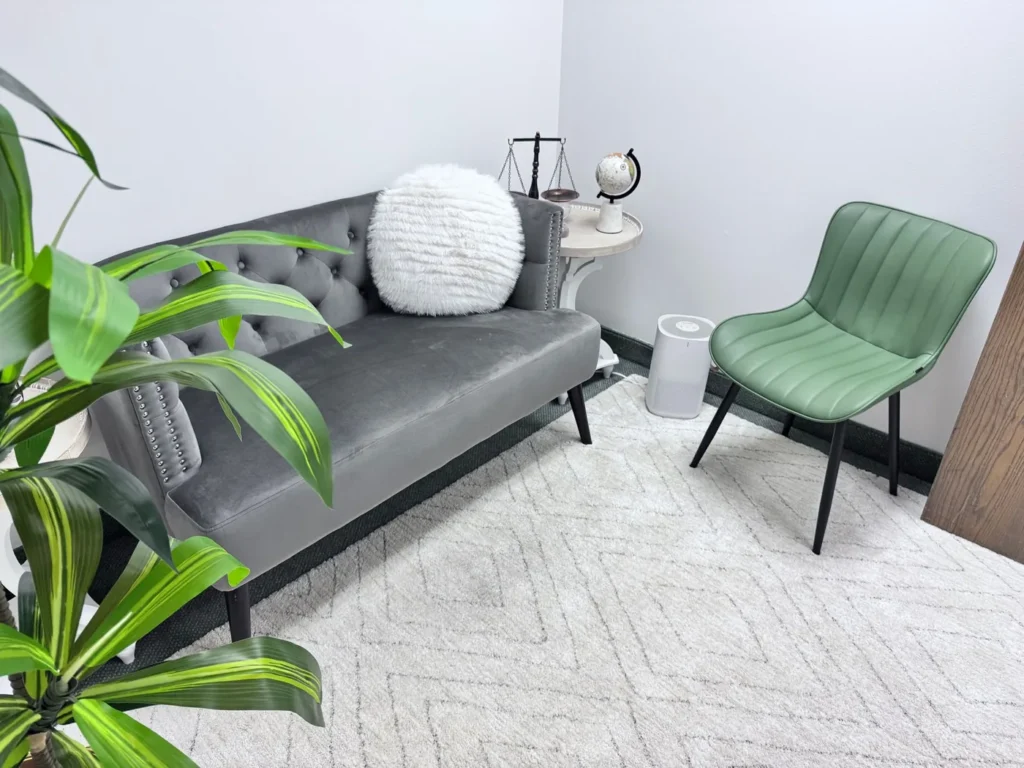 Counselling room with sofa and armchair for individual therapy in Vaughan