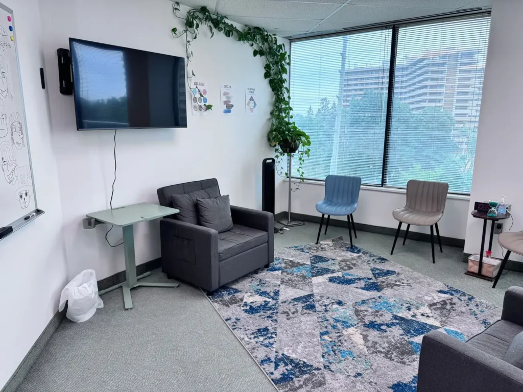 Bright group therapy room with seating at Batool Psychotherapy & Wellness, Vaughan
